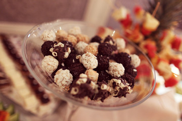 Chocolate balls on rounded plate