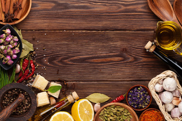 Various spices on wooden background