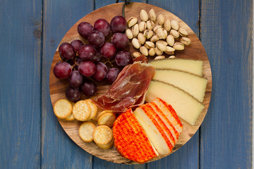 cheese with meat and fruits