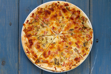 pizza on blue background