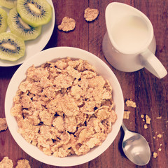 cereals in bowl and kiwi