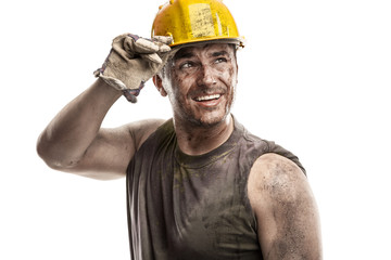 Young dirty Worker Man With Hard Hat helmet - obrazy, fototapety, plakaty