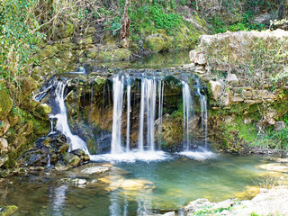 Waterfall by ancient Roman Bridge, Fornoli, Italy.