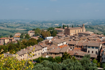 Fototapeta na wymiar Panoramic view and Sant Agostino church at San Gimignano