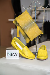 Yellow bag and women's moccasins, a new collection