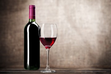 Fototapeta na wymiar Wine Bottle. Red wine bottle and glass, isolated on white