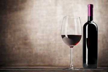 Wine Bottle. Red wine bottle and glass, isolated on white