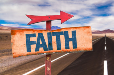 Faith sign with road background