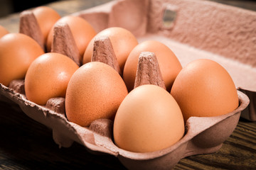 Chicken eggs in carton tray