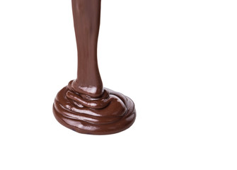 Pouring hot chocolate liquid over white background