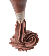 Piping chocolate topping on white background