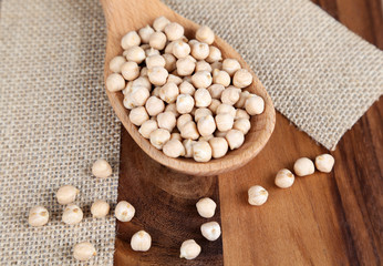 beans in a wooden spoon