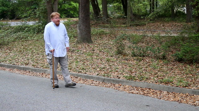 Disabled Man Using Cane