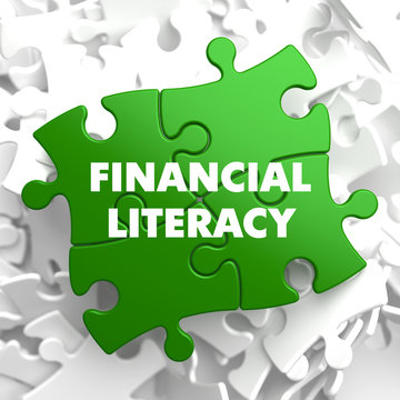 Financial Literacy on Green Puzzle.