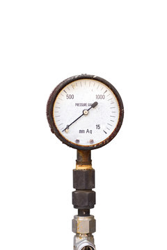 Old pressure gauge on white background