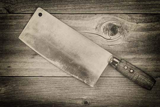 Vintage butcher Knife on rustic cedar wood