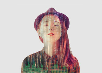 Double exposure portrait of beautiful girl with trees