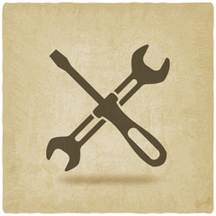 screw driver and wrench symbol old background