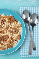 Oatmeal flakes with nuts in plate