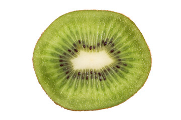 Closeup of a sliced kiwifruit viewed from the front, isolated