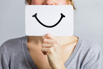 Happy Portrait of Someone Holding a Smiling Mood Board