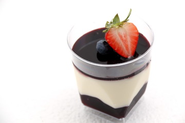 Dessert food blueberry  panacota and wild berry trifle.