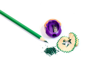 The green colored pencils with a Sharpener