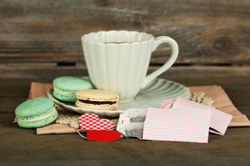 Heart shaped teabag tags, macaroons and cup of tea