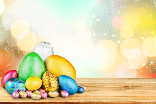 Easter. Group of colorful candy Easter eggs wrapped in foil with