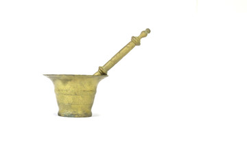 Old golden pestle and mortar