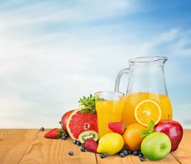 Advertise. Summer background with wooden empty table and green