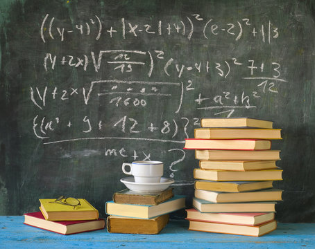 Books and blackboard, learning,education concept