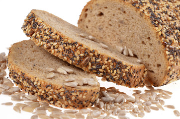 Slices whole grain bread decorated with natural cereals