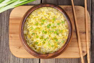 Healthy traditional asian food drop egg soup with broth on
