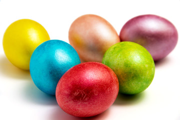 Easter colored eggs  on white bacground