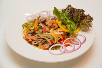 Cold salad with pork meat