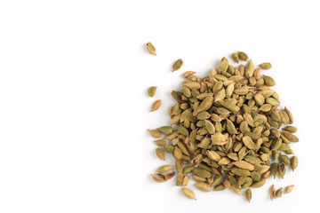 Pile of green cardamom seeds isolated on white background