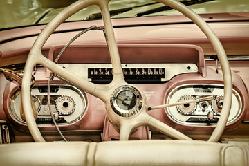 Retro styled image of the interior of a classic car