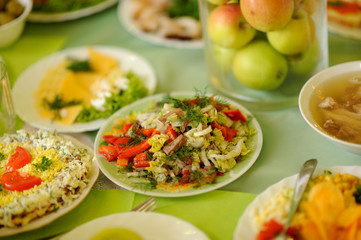 table set service with silverware and glass stemware at restaurant before party