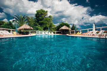Swimming pool with stair at hotel