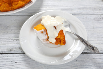 Small piece of cake in cream
