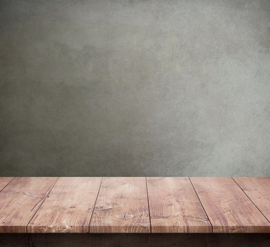 Wood table with concrete texture background