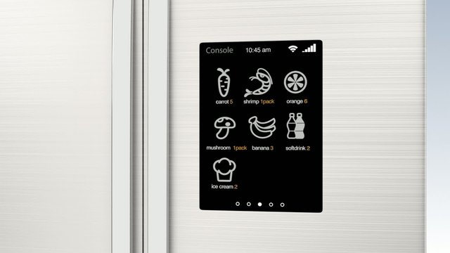 Smart refrigerator with LCD touch screen. Concept  of IoT.
