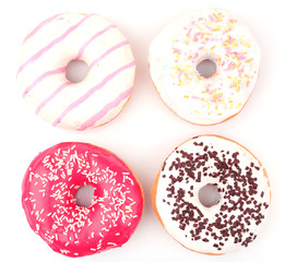 Delicious donuts with icing isolated on white