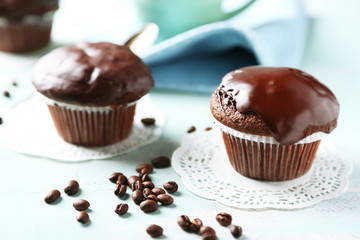 Tasty homemade chocolate muffins and cup of coffee