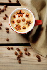 Cup of coffee on old wooden table