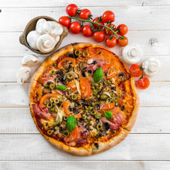 Pizza with ham and olives