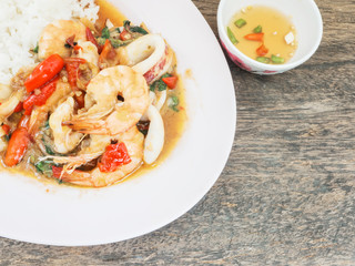Thai food spicy squid and shrimp with fish sauce
