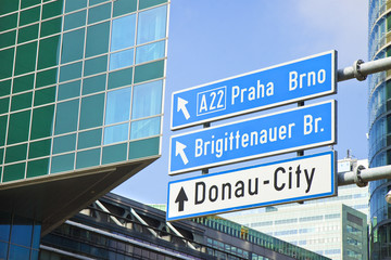 Donau City roadsign on blue background (Wien - Austria)