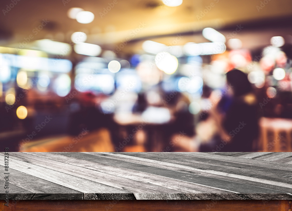 Aufkleber empty wood table top with coffee shop blur with bokeh background